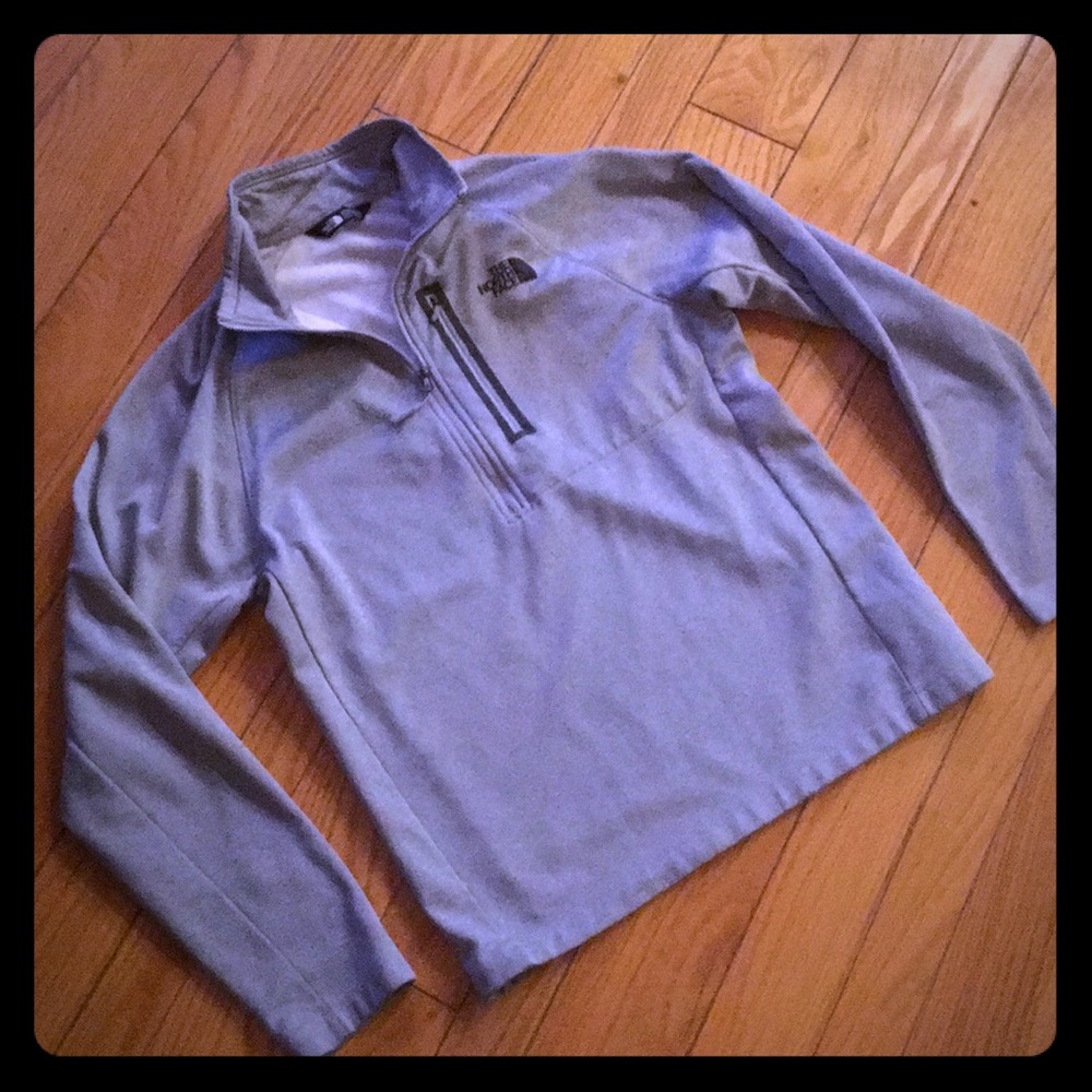 The North Face half zip pull over Size M